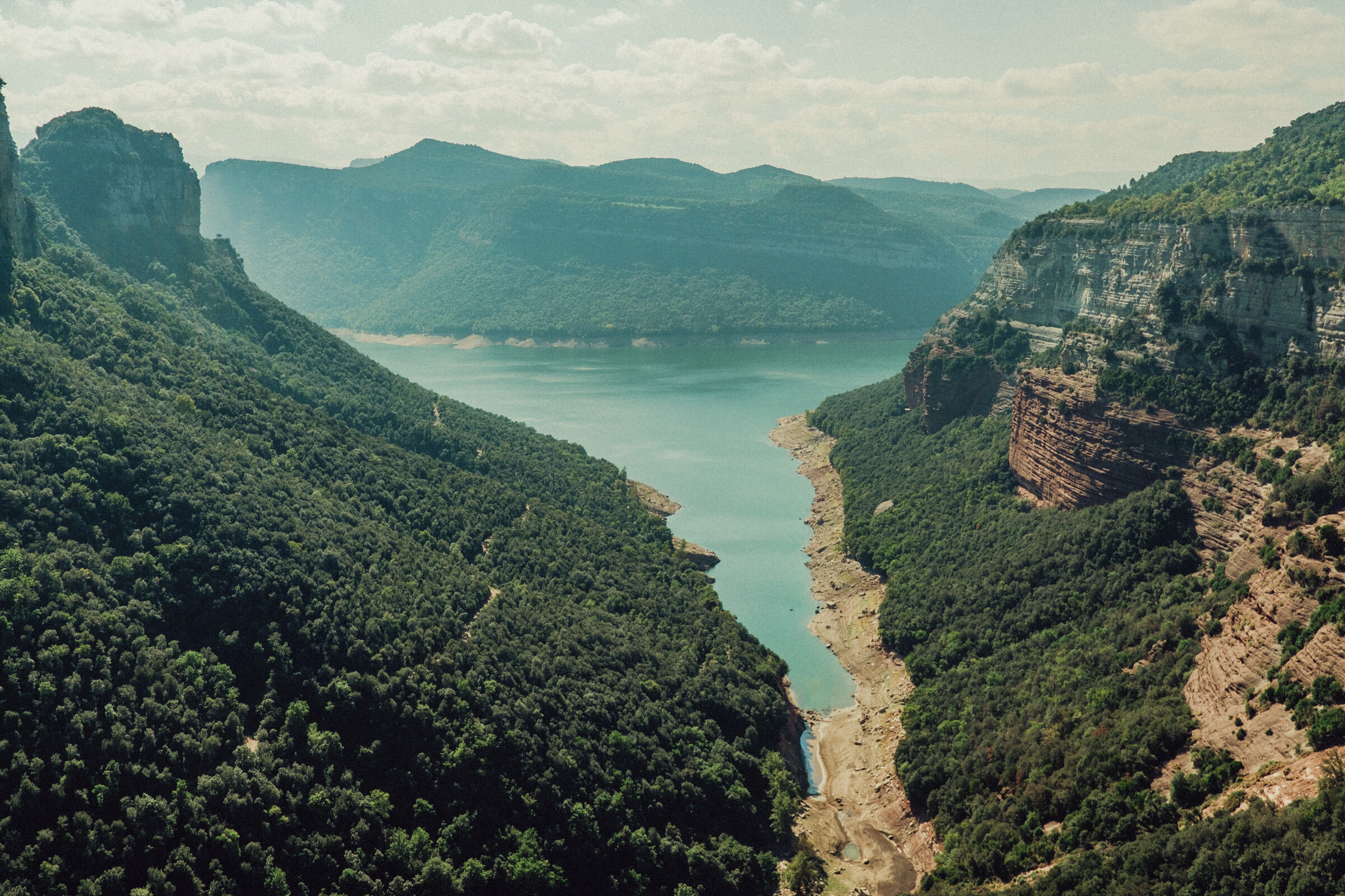 Aerial View of Mountains and Lake