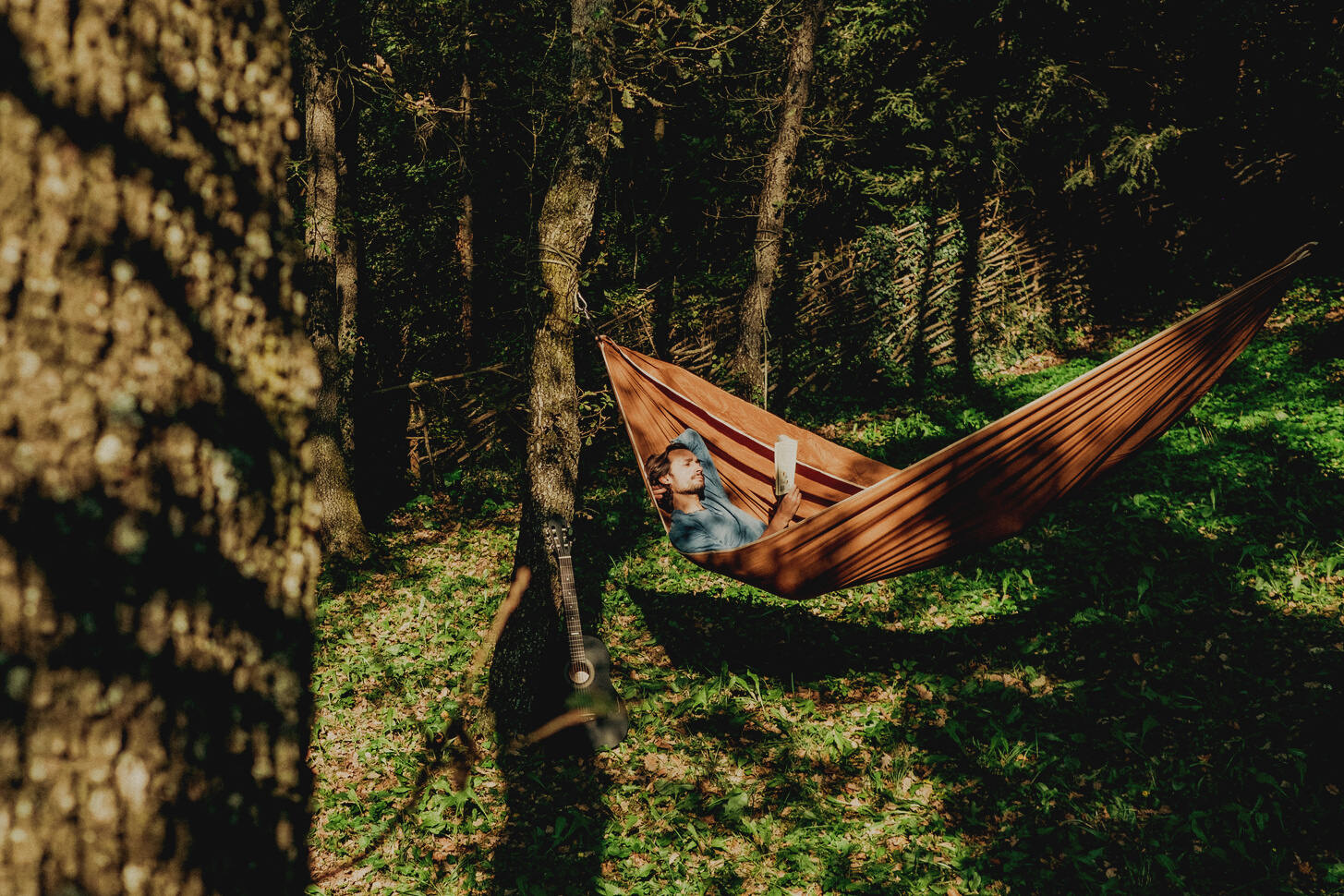 Man Relaxing in Hammock